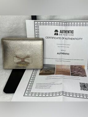 EUC Prada Saffiano Leather Metallic Bi-Fold Wallet w/ Bow Accent - COA Included